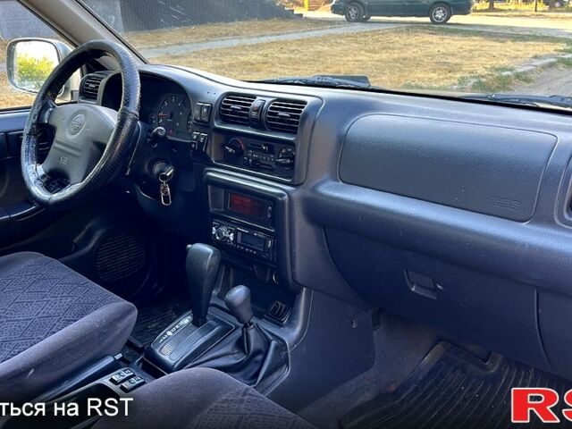 Сірий Опель Фронтера, об'ємом двигуна 2.2 л та пробігом 257 тис. км за 3800 $, фото 6 на Automoto.ua
