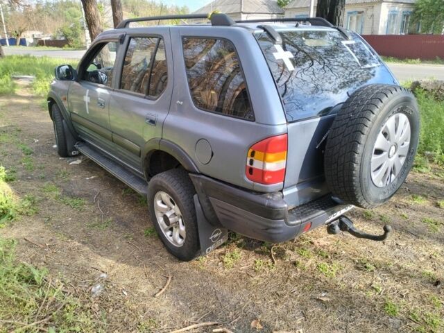 Серый Опель Фронтера, объемом двигателя 2 л и пробегом 397 тыс. км за 3000 $, фото 3 на Automoto.ua