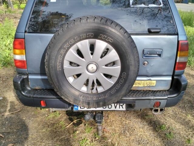 Серый Опель Фронтера, объемом двигателя 2 л и пробегом 397 тыс. км за 3000 $, фото 2 на Automoto.ua