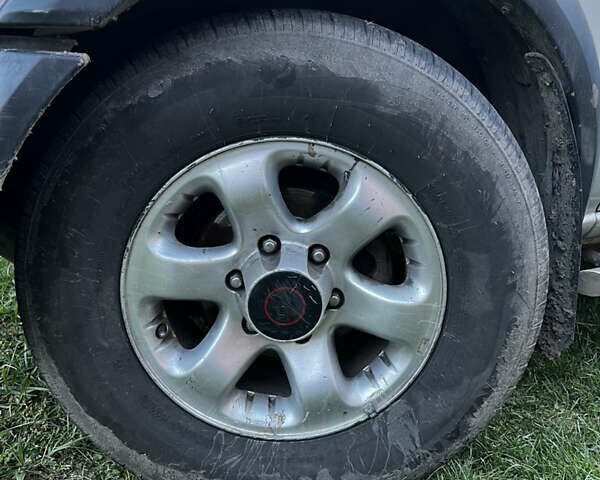 Серый Опель Фронтера, объемом двигателя 2.17 л и пробегом 186 тыс. км за 4900 $, фото 5 на Automoto.ua