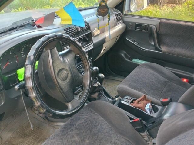 Серый Опель Фронтера, объемом двигателя 2 л и пробегом 397 тыс. км за 3000 $, фото 1 на Automoto.ua