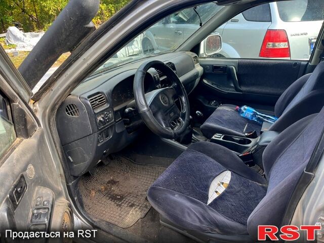 Серый Опель Фронтера, объемом двигателя 2.2 л и пробегом 500 тыс. км за 1500 $, фото 4 на Automoto.ua