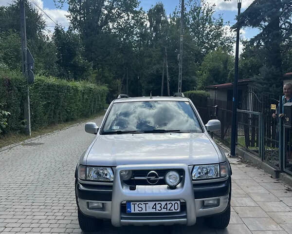 Серый Опель Фронтера, объемом двигателя 2.2 л и пробегом 250 тыс. км за 3750 $, фото 2 на Automoto.ua