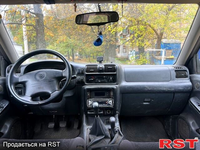 Серый Опель Фронтера, объемом двигателя 2.2 л и пробегом 200 тыс. км за 5800 $, фото 5 на Automoto.ua