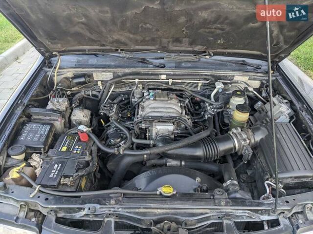 Сірий Опель Фронтера, об'ємом двигуна 3.2 л та пробігом 200 тис. км за 5500 $, фото 13 на Automoto.ua