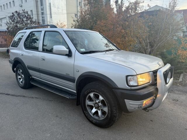 Серый Опель Фронтера, объемом двигателя 2.2 л и пробегом 258 тыс. км за 2600 $, фото 2 на Automoto.ua
