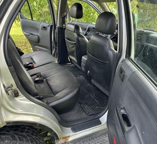 Серый Опель Фронтера, объемом двигателя 2.2 л и пробегом 283 тыс. км за 2000 $, фото 6 на Automoto.ua