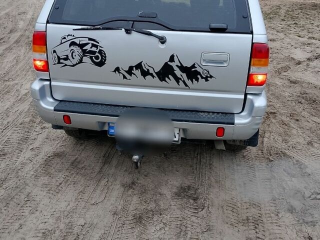 Серый Опель Фронтера, объемом двигателя 2 л и пробегом 308 тыс. км за 7000 $, фото 3 на Automoto.ua