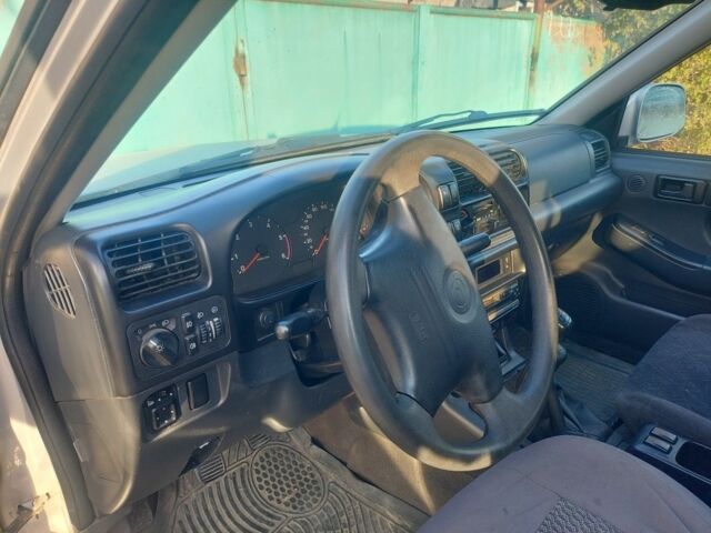 Серый Опель Фронтера, объемом двигателя 2.2 л и пробегом 336 тыс. км за 3799 $, фото 6 на Automoto.ua