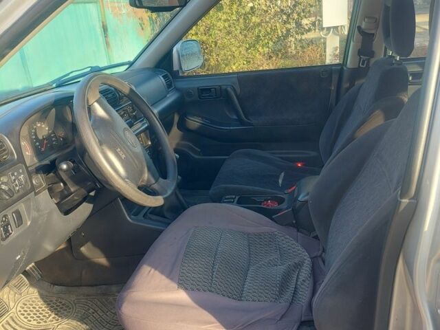 Серый Опель Фронтера, объемом двигателя 2.2 л и пробегом 336 тыс. км за 3799 $, фото 13 на Automoto.ua