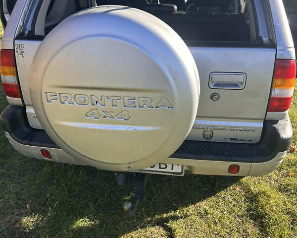 Сірий Опель Фронтера, об'ємом двигуна 2.17 л та пробігом 289 тис. км за 4999 $, фото 18 на Automoto.ua