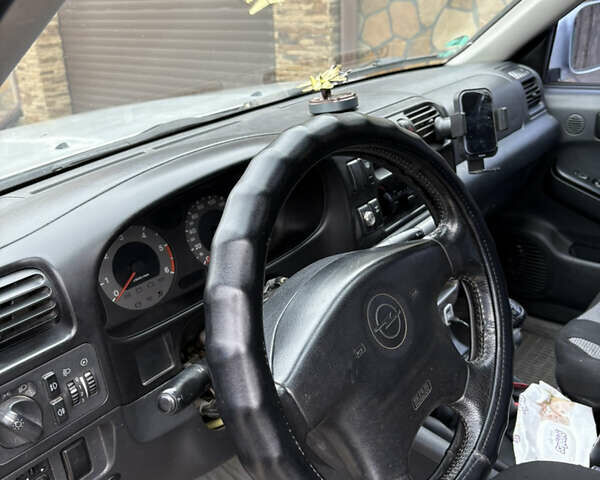 Сірий Опель Фронтера, об'ємом двигуна 2.2 л та пробігом 399 тис. км за 6500 $, фото 7 на Automoto.ua