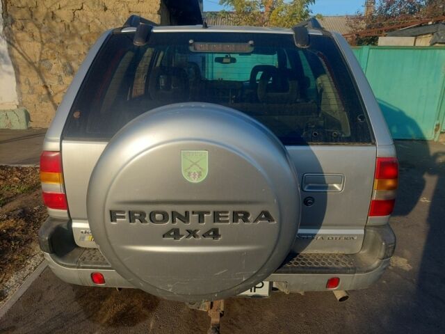 Серый Опель Фронтера, объемом двигателя 2.2 л и пробегом 336 тыс. км за 3799 $, фото 2 на Automoto.ua