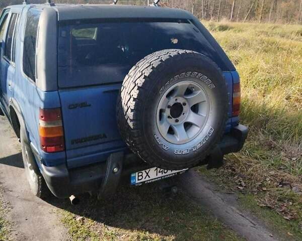 Синий Опель Фронтера, объемом двигателя 2.4 л и пробегом 290 тыс. км за 3500 $, фото 1 на Automoto.ua