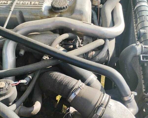 Синий Опель Фронтера, объемом двигателя 2.4 л и пробегом 290 тыс. км за 3500 $, фото 3 на Automoto.ua