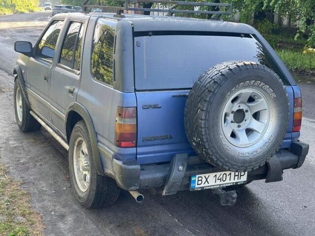 Синий Опель Фронтера, объемом двигателя 2.4 л и пробегом 290 тыс. км за 4500 $, фото 3 на Automoto.ua