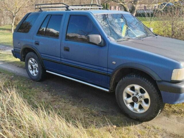 Синий Опель Фронтера, объемом двигателя 2.4 л и пробегом 290 тыс. км за 3500 $, фото 1 на Automoto.ua