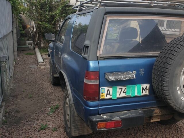 Синий Опель Фронтера, объемом двигателя 2.2 л и пробегом 336 тыс. км за 3000 $, фото 13 на Automoto.ua