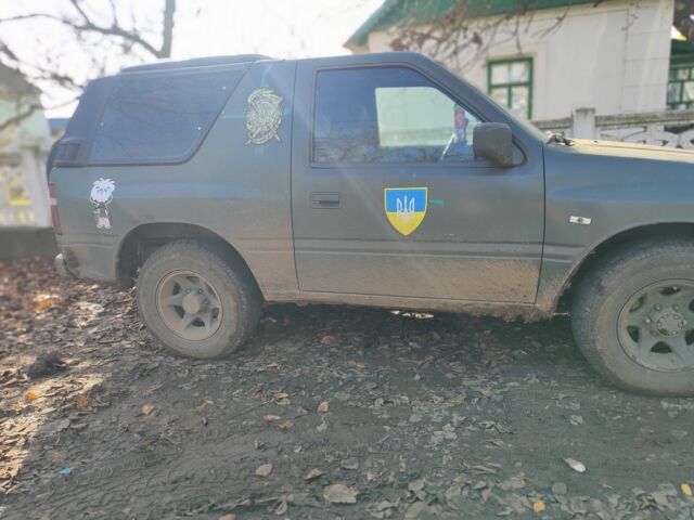 Синій Опель Фронтера, об'ємом двигуна 2 л та пробігом 300 тис. км за 2550 $, фото 1 на Automoto.ua