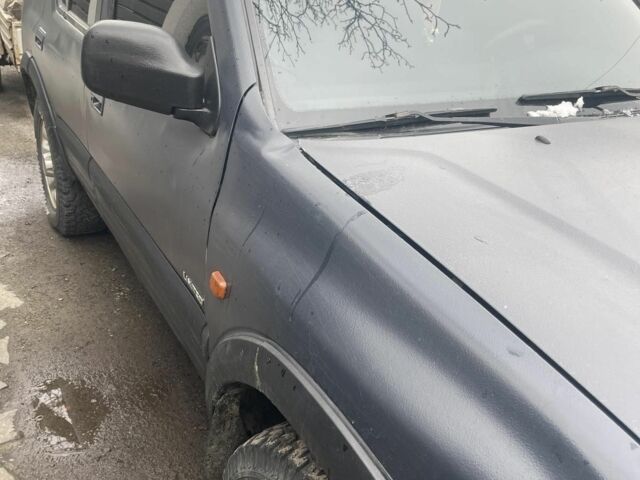 Синий Опель Фронтера, объемом двигателя 2.2 л и пробегом 280 тыс. км за 4300 $, фото 2 на Automoto.ua