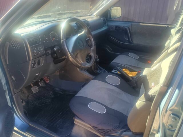 Синий Опель Фронтера, объемом двигателя 2.2 л и пробегом 171 тыс. км за 6300 $, фото 20 на Automoto.ua