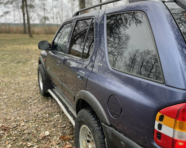 Синий Опель Фронтера, объемом двигателя 2.17 л и пробегом 500 тыс. км за 3950 $, фото 6 на Automoto.ua