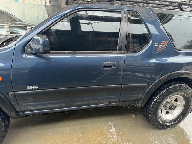 Синій Опель Фронтера, об'ємом двигуна 2.2 л та пробігом 300 тис. км за 3900 $, фото 2 на Automoto.ua