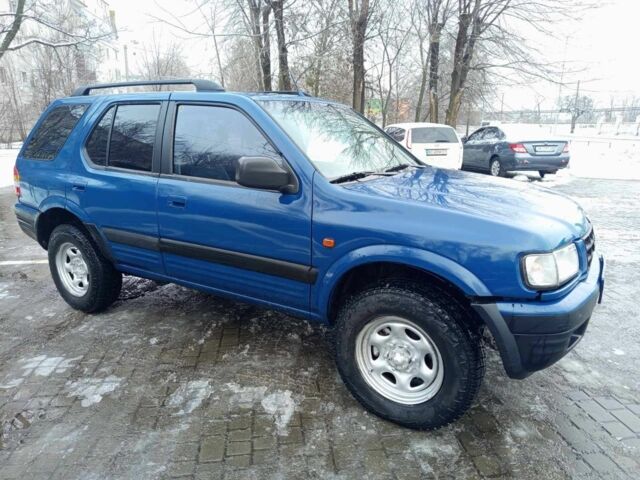 Синий Опель Фронтера, объемом двигателя 2 л и пробегом 320 тыс. км за 2650 $, фото 1 на Automoto.ua