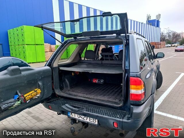 Синій Опель Фронтера, об'ємом двигуна 2.2 л та пробігом 314 тис. км за 7400 $, фото 2 на Automoto.ua
