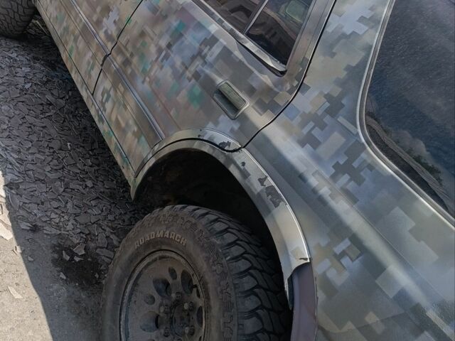 Зеленый Опель Фронтера, объемом двигателя 2.3 л и пробегом 300 тыс. км за 2400 $, фото 1 на Automoto.ua