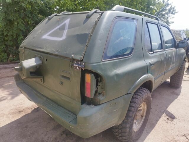 Зеленый Опель Фронтера, объемом двигателя 2.2 л и пробегом 280 тыс. км за 2261 $, фото 4 на Automoto.ua