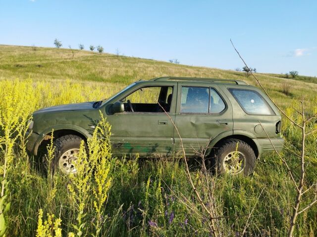 Зеленый Опель Фронтера, объемом двигателя 2.2 л и пробегом 280 тыс. км за 2261 $, фото 2 на Automoto.ua