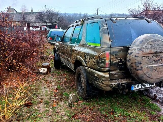 Зеленый Опель Фронтера, объемом двигателя 2.2 л и пробегом 250 тыс. км за 1500 $, фото 3 на Automoto.ua