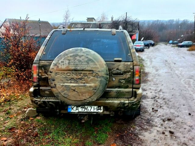 Зеленый Опель Фронтера, объемом двигателя 2.2 л и пробегом 250 тыс. км за 1500 $, фото 2 на Automoto.ua