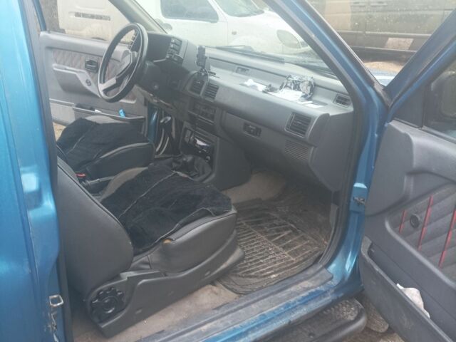 Зеленый Опель Фронтера, объемом двигателя 2 л и пробегом 280 тыс. км за 4100 $, фото 5 на Automoto.ua