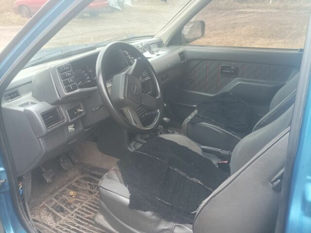 Зеленый Опель Фронтера, объемом двигателя 2 л и пробегом 280 тыс. км за 4100 $, фото 4 на Automoto.ua