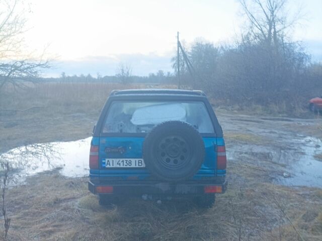 Зеленый Опель Фронтера, объемом двигателя 2 л и пробегом 280 тыс. км за 4100 $, фото 2 на Automoto.ua