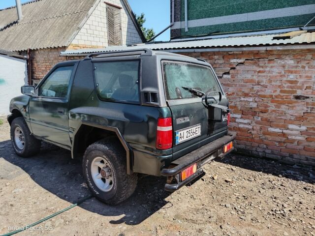 Зеленый Опель Фронтера, объемом двигателя 2 л и пробегом 25 тыс. км за 4000 $, фото 2 на Automoto.ua