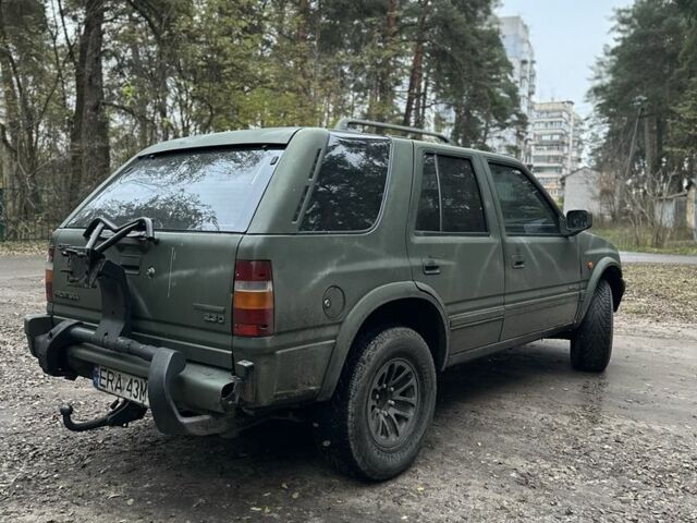 Зеленый Опель Фронтера, объемом двигателя 2.3 л и пробегом 240 тыс. км за 2400 $, фото 2 на Automoto.ua
