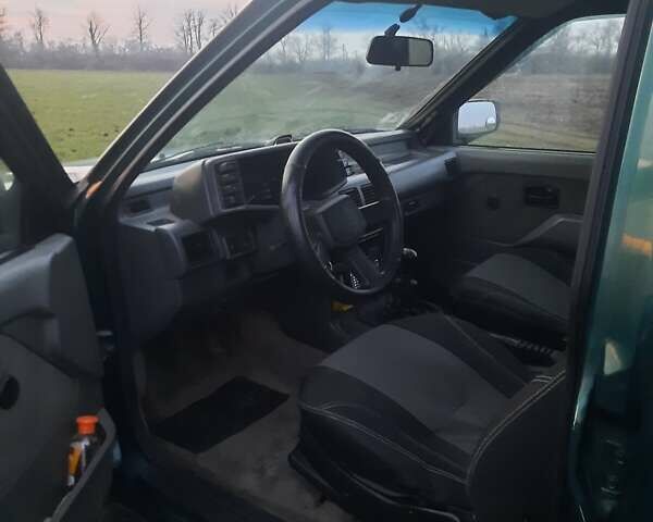 Зелений Опель Фронтера, об'ємом двигуна 2.3 л та пробігом 310 тис. км за 5900 $, фото 7 на Automoto.ua