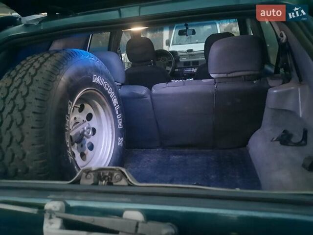 Зелений Опель Фронтера, об'ємом двигуна 2.3 л та пробігом 310 тис. км за 5900 $, фото 4 на Automoto.ua