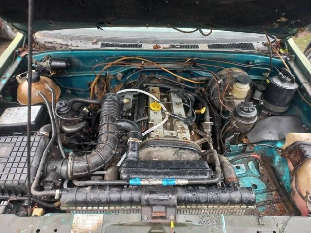 Зеленый Опель Фронтера, объемом двигателя 2.2 л и пробегом 354 тыс. км за 1200 $, фото 6 на Automoto.ua