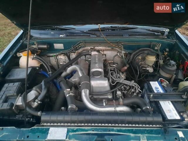 Зелений Опель Фронтера, об'ємом двигуна 2.3 л та пробігом 310 тис. км за 5900 $, фото 5 на Automoto.ua