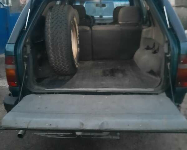 Зелений Опель Фронтера, об'ємом двигуна 2.3 л та пробігом 310 тис. км за 5900 $, фото 6 на Automoto.ua