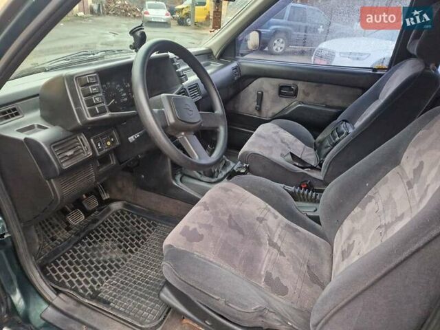 Зеленый Опель Фронтера, объемом двигателя 2.2 л и пробегом 213 тыс. км за 3000 $, фото 7 на Automoto.ua