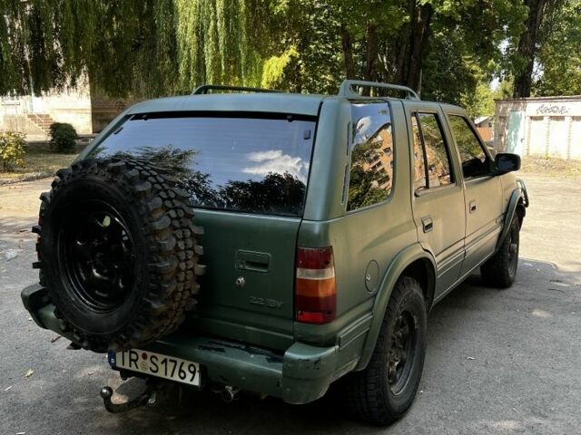 Зеленый Опель Фронтера, объемом двигателя 2 л и пробегом 200 тыс. км за 3900 $, фото 4 на Automoto.ua