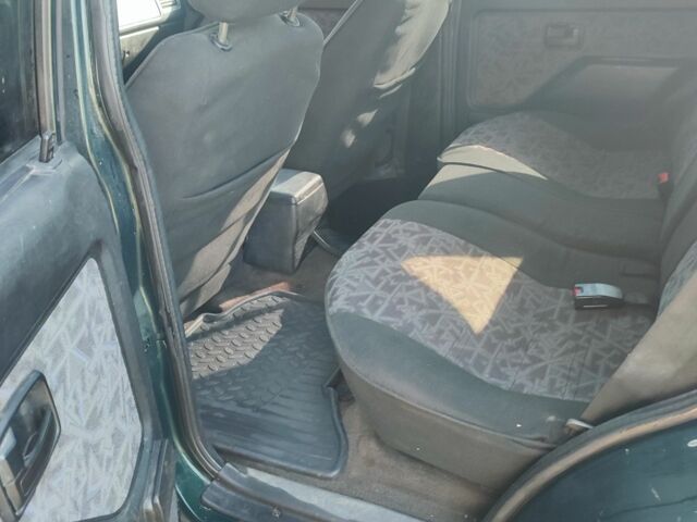 Зеленый Опель Фронтера, объемом двигателя 2.5 л и пробегом 238 тыс. км за 4800 $, фото 6 на Automoto.ua