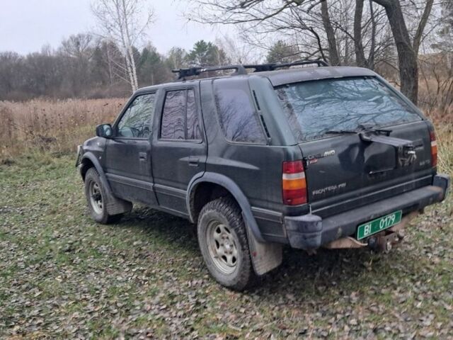 Зелений Опель Фронтера, об'ємом двигуна 2.3 л та пробігом 315 тис. км за 1899 $, фото 5 на Automoto.ua