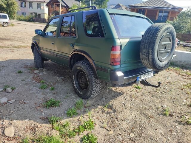 Зеленый Опель Фронтера, объемом двигателя 2.5 л и пробегом 238 тыс. км за 4800 $, фото 4 на Automoto.ua