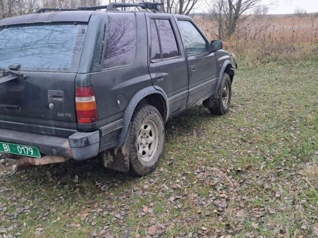 Зелений Опель Фронтера, об'ємом двигуна 2.3 л та пробігом 315 тис. км за 1899 $, фото 6 на Automoto.ua